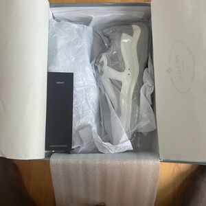 Prada Gray and White Sneakers
New